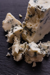 delicious blue cheese on wooden rustic background