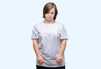 Fototapeta premium Young adult woman with down syndrome over isolated background depressed and worry for distress, crying angry and afraid. Sad expression.