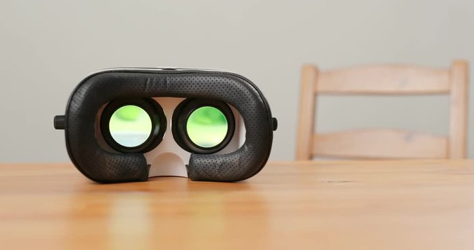 Virtual reality device play video inside and put on the table