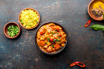 INDIAN FOOD. ROGAN JOSH curry sauce. Pork rogan josh with rice