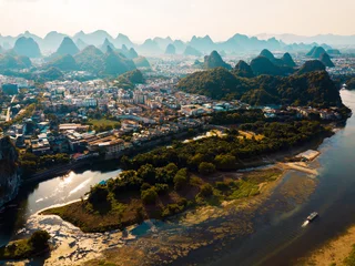 Afwasbaar fotobehang Guilin aerial view with Li river and stunning rock formations in China © creativefamily