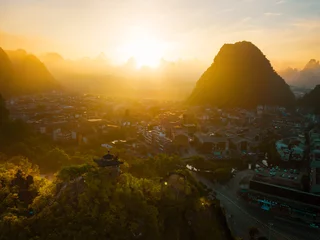 Tuinposter Aerial photo of a sunrise in Guangxi China © creativefamily