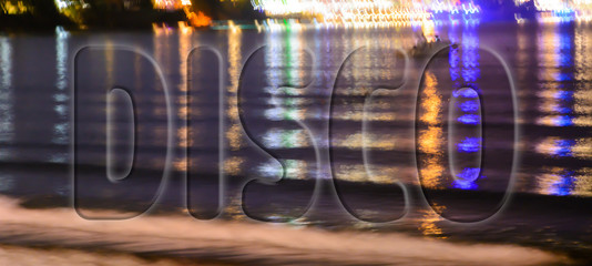 abstract background neon highlights on the water. the inscription disco with a slight glow
