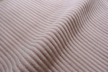 Fototapeta na wymiar beige velor fabric closeup