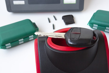 Production of automobile keys. Cloning of car transporders and chips.