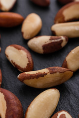 brazil nut on a dark stone background