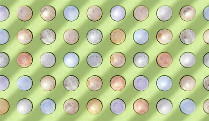 Marble spheres in the green wall with lines of shadow. 3d rendering.