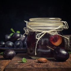 Plum compote in jar