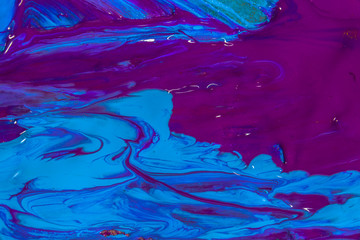 colorful of screen printing ink dropped on the ground made an abstract art