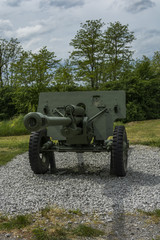 Exposed old tank of war. Big cannon on the military vehicle.