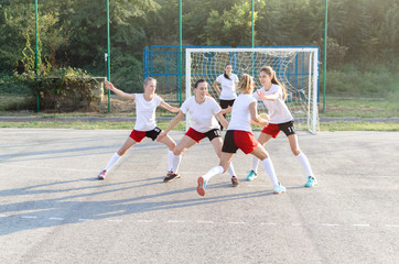 Female handball team playing a match