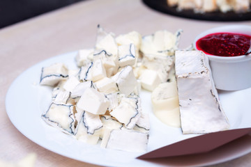 Plate of fresh sliced goat cheese