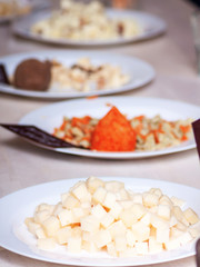 Plate of fresh sliced goat cheese