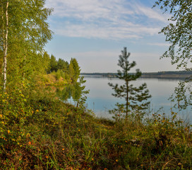 Artificial lake formed after the removal of sand. Closed sand quarry.