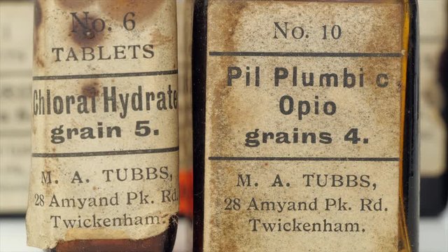 Antique medicine bottles of Chloral Hydrate and Opium In an antique medicine set from the early 20th century.  Pil Plumbi cum Opio is a mix of lead and opium. Chloral hydrate is a sedative. 