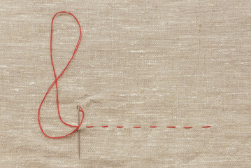 sewing thread and for knitting the red thread is looped