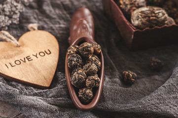 rolled tea leaves into a large pearl. Chinese tea from Yunnan province. Biluochun. Tea ceremony