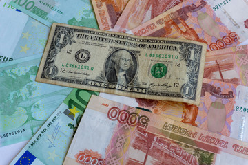 one dollar, euro and rubles