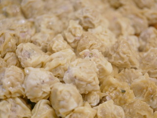 Fototapeta na wymiar Close up and selective focus of steamed chinese dumpling (Shu Mai) (Kha Nom Jib)
