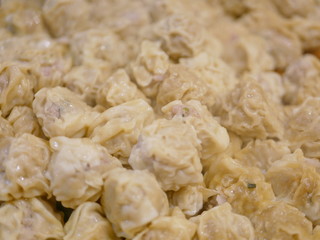 Close up and selective focus of steamed chinese dumpling (Shu Mai) (Kha Nom Jib)