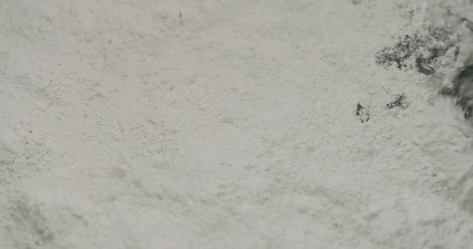 Slow motion mixing hardener in micro concrete plaster