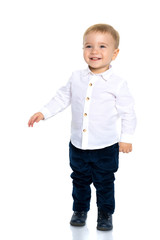 The little boy is emotionally waving his arms.