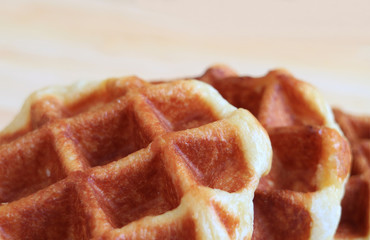 Close Up of Mouthwatering Belgian Waffles with Free Space for Text and Design 