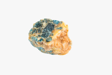 Bright apatite stone crystal isolated. Macro shooting.