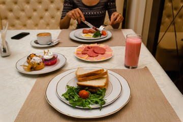 Breakfast at the hotel restaurant with a girlfriend alone