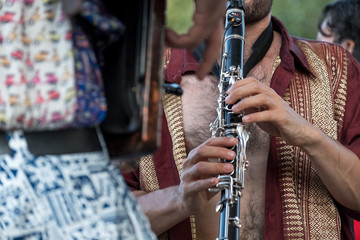 Close up of accordion player playing at Klezmer concert in Regent's Park in London.