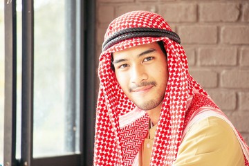 Arabian man is smiling
