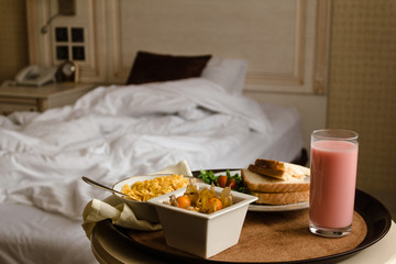 Breakfast in bed in hotel room. Accommodation