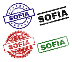 SOFIA seal prints with corroded surface. Black, green,red,blue vector rubber prints of SOFIA text with grunge surface. Rubber seals with circle, rectangle, medallion shapes.