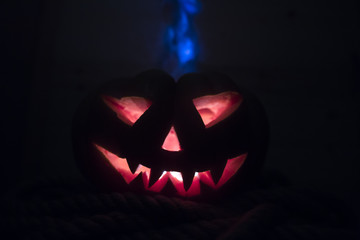 Jack-o-lantern Halloween pumpkin head. Scary evil face spooky holiday. Halloween part. Halloween attributes.