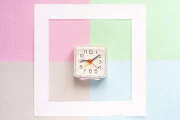 top view of minimalist concept with vintage watches in white empty frame isolated on color surface f