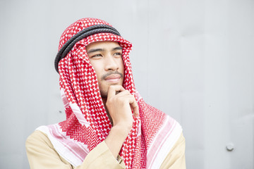 Arabian man is thinking