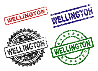 WELLINGTON seal prints with corroded surface. Black, green,red,blue vector rubber prints of WELLINGTON title with dust texture. Rubber seals with round, rectangle, rosette shapes.