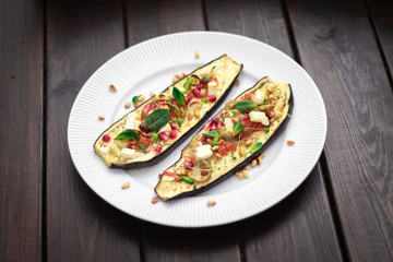 Baked Aubergines with Pomegranate, Mint and Pine Nuts