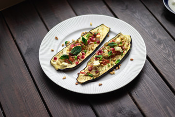 Baked Aubergines with Pomegranate, Mint and Pine Nuts