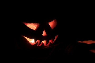 Jack-o-lantern Halloween pumpkin head. Scary evil face spooky holiday. Halloween part. Halloween attributes.