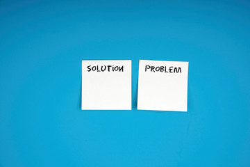 Problem and solution wording on a sticky note. business management concept