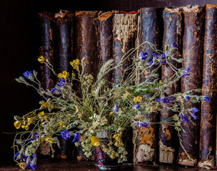 old books and dry flowers