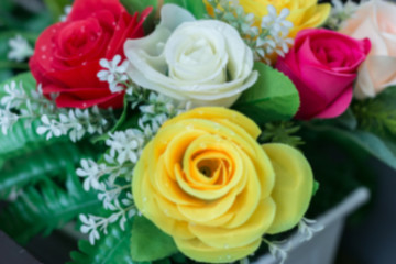 Colorful of decoration artificial flower in flower pot. The fabric flowers bouquet.