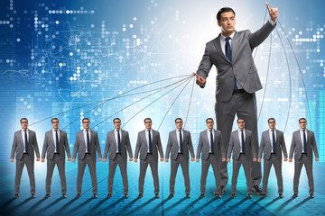 Boss employee manipulating his staff in business concept