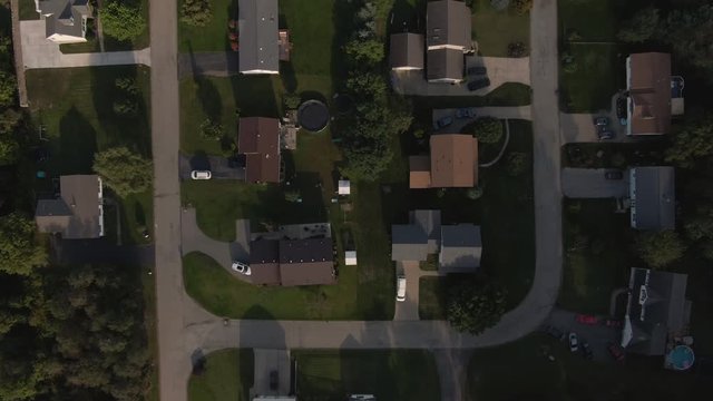 A top down aerial flyover view of a typical western Pennsylvania residential neighborhood. Pittsburgh suburbs.  	