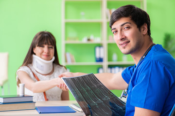 Female patient visiting male doctor in medical concept 