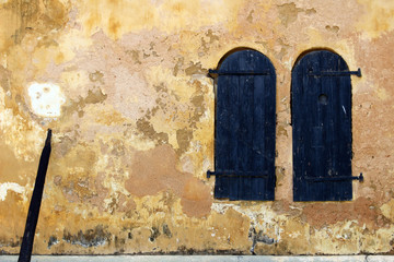 The rustic and rugged window, door, and lamp around Galle Fort complex