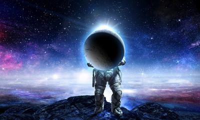 Spaceman carry big planet. Mixed media