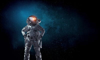 Fototapeta premium Spaceman and his mission. Mixed media