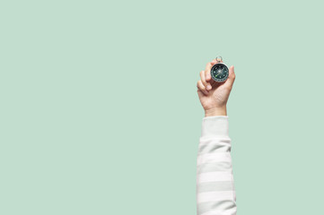 Woman holding compass